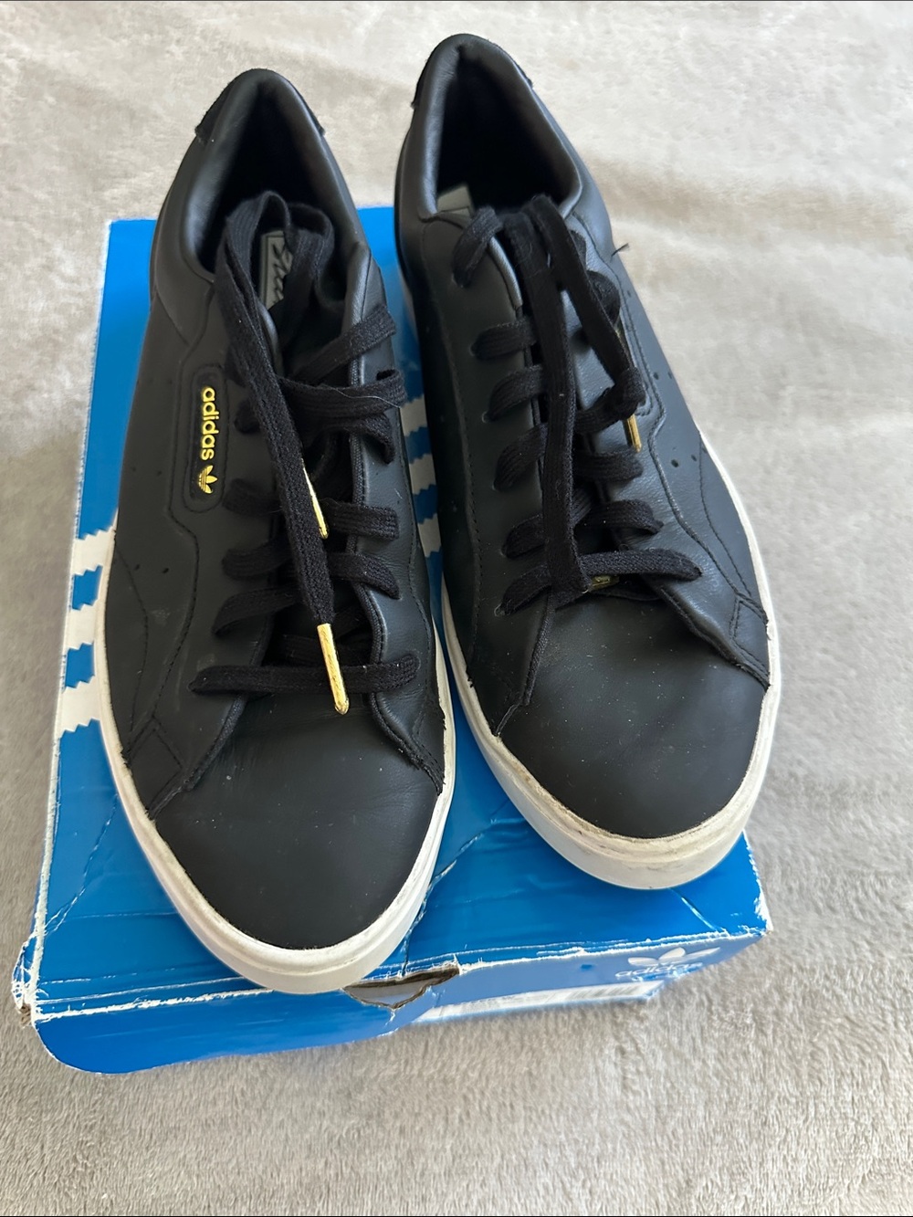 adidas Black Low-Top Sneakers with Gold Accents women’s 9